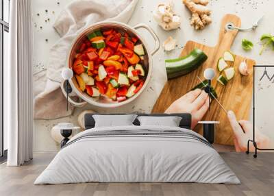 cooking - chef's hands preparing vegetarian stew Wall mural