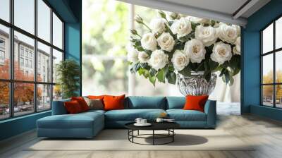 A beautifully arranged bouquet of white roses in an ornate silver vase on a marble table with soft, natural light Wall mural