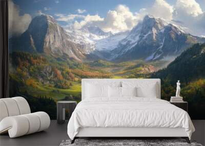 A mountain landscape with green summer meadows and autumn colors creeping down the slopes, symbolizing the seasonal shift Wall mural