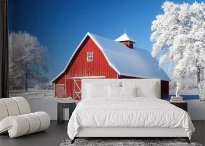 A red barn with a snow-covered roof, symbolizing rural life in winter Wall mural