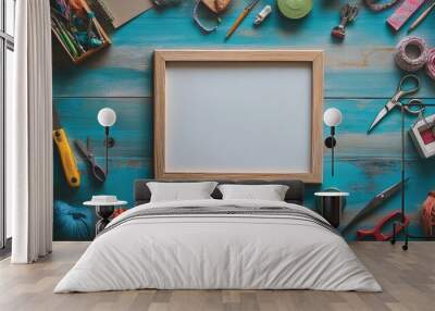 A single wooden frame on a desk filled with craft supplies, scissors, and ribbons, creating a DIY theme Wall mural