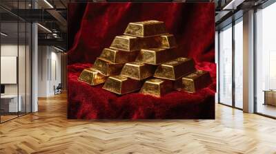 Stacked gold ingots placed on a red velvet surface, signifying luxury and opulence Wall mural