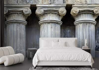 The texture of weathered marble columns from an ancient building, showing the history and natural wear of the stone. Wall mural