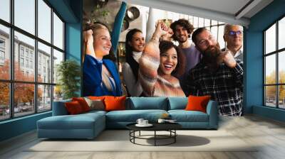 Multiracial group of casual people exulting. Wall mural