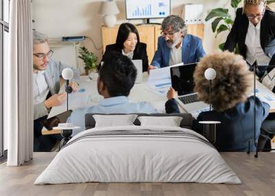 group of multi-ethnic and different age workers in office work Wall mural