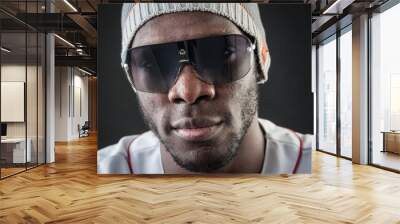 confident black man close up portrait with sunglasses against da Wall mural