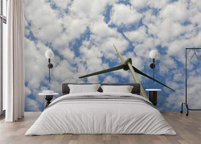 Turbine, cloudy sky in the background. Wall mural