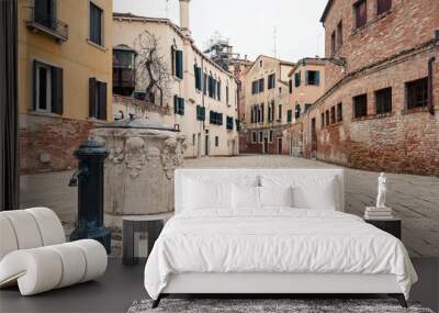 Typical square and fountain. Venice, Italy. Wall mural