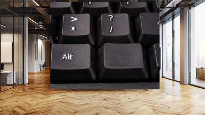 An enlarged computer keyboard. Black keyboard buttons for the computer. Wall mural