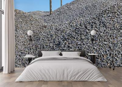 Huge piles of aggregate on the construction site. Wall mural