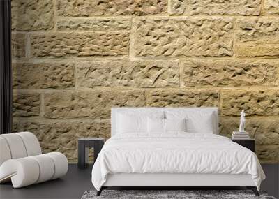 Light brown and gray stone wall with light grout. Beautiful old stone pattern, background. Wallpaper Wall mural