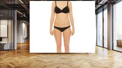 Happy woman standing in bikini. Wall mural