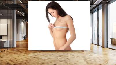 Woman measuring her body Wall mural