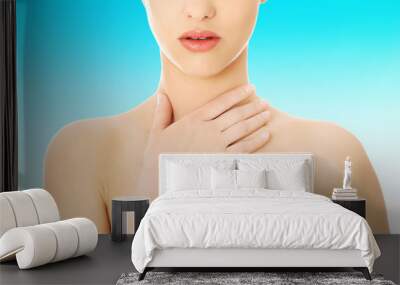 Woman with a throat pain Wall mural