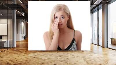 young blond woman cleaing her face Wall mural