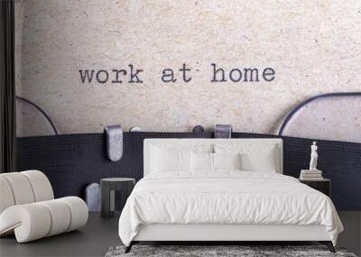 The word work at home written in typewriter font. The inscription in the old style on gray paper. Wall mural