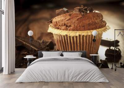 Dark muffin with chocolate Wall mural