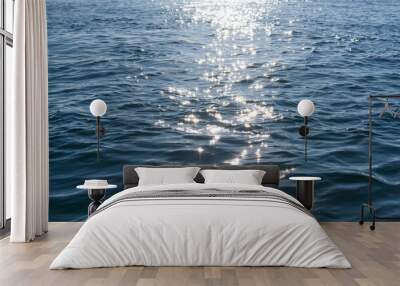 sea water with sun reflections Wall mural