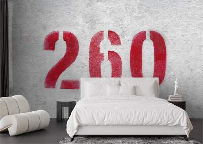 Red Number 260 on the white wall. Spray paint. Wall mural