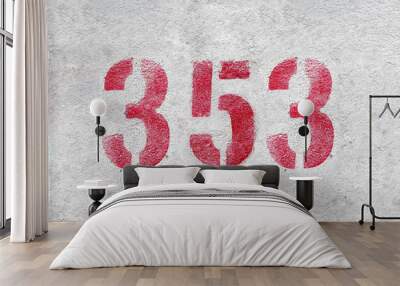 Red Number 353 on the white wall. Spray paint. Wall mural