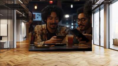 Young friends bonding over drinks and conversation at modern urban restaurant Wall mural