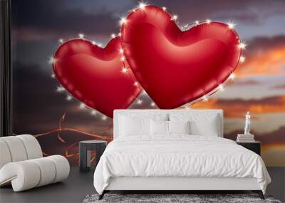 Two red heart shaped balloons in flight Wall mural