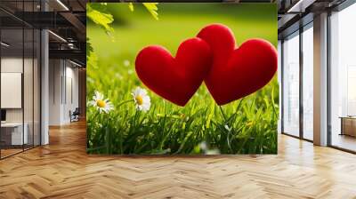 Two red hearts on green grass Wall mural