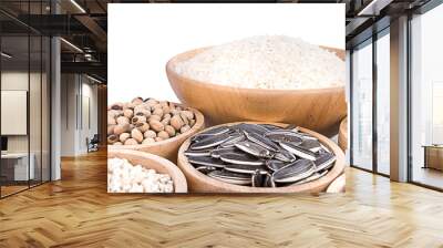 Cereal grains , seeds, beans on wooden background Wall mural