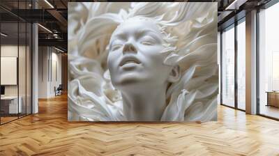 A woman's face is shown in a white sculpture, with her eyes closed Wall mural