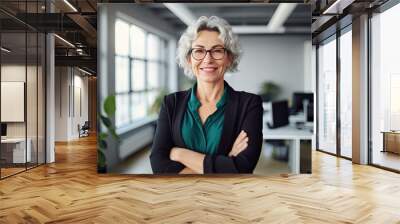 Mature businesswoman smiling in office. Photo generative AI Wall mural