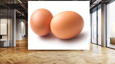 closeup of two organic eggs on white background Wall mural