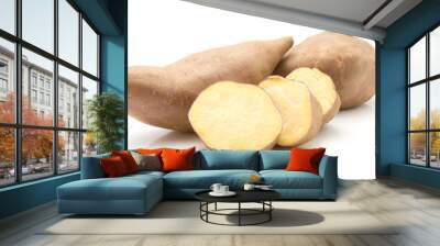 Two sweet potato and three slices isolated on white background. Wall mural