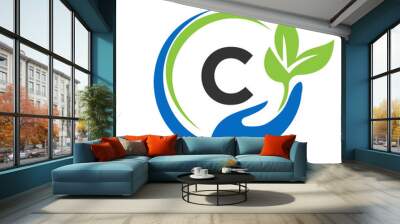 Hand On Letter C Logo Design. C Healthcare Care, Foundation with Hand Symbol Wall mural