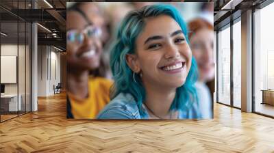 Diverse and inclusive group of office colleagues smiling at a team building workshop event, workplace race inclusion and diversity concept. Happy mixed race female employee with blue hair Wall mural