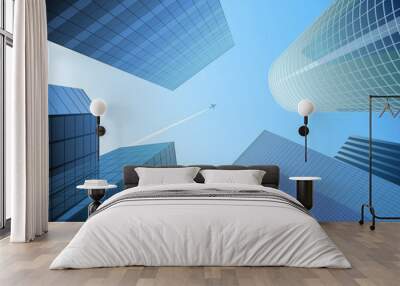 blue city and airplane in the sky Wall mural