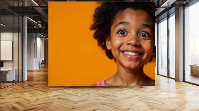 A beautiful generic cartoon portrait of an African-American or Hispanic happy young womangirl against an orange backdrop Wall mural