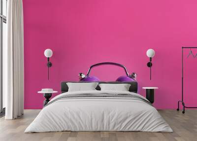 Alarm clock on color background Wall mural