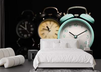 Alarm clocks on black background Wall mural