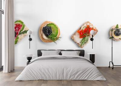 Assortment of tasty canapes on white background Wall mural