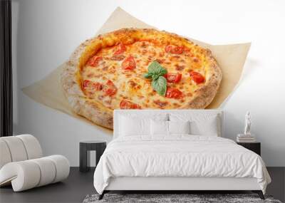 Baking paper with tasty pizza Margarita and basil on white background Wall mural