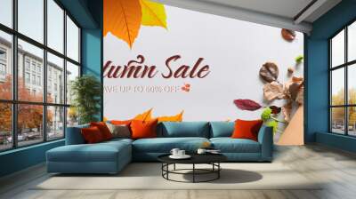 Banner for autumn sale with dry leaves Wall mural