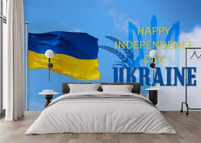 Banner for Ukrainian Independence Day with waving flag against blue sky Wall mural