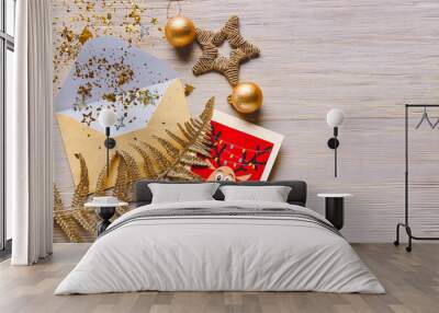 Beautiful composition with New Year greeting card on wooden background Wall mural