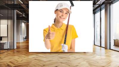 Beautiful female golfer showing thumb-up on white background Wall mural