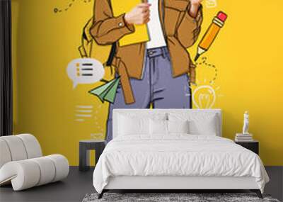 Beautiful female student in drawn clothes on yellow background Wall mural