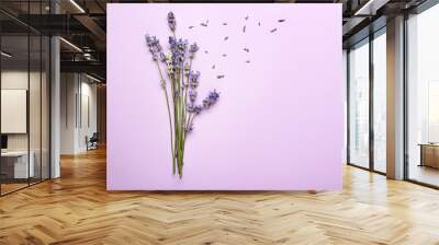 Beautiful lavender flowers on color background Wall mural