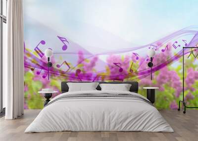 Beautiful lilac tree on blue sky background Wall mural