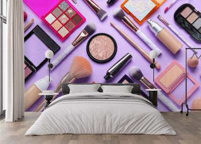 beautiful makeup brushes with decorative cosmetics on lilac background Wall mural