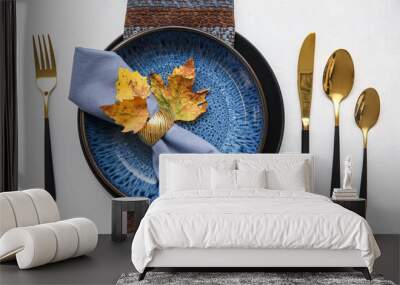 Beautiful table setting with autumn leaves on white background Wall mural