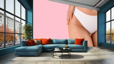 Beautiful young woman with stretch marks on her body against pink background with space for text, closeup Wall mural